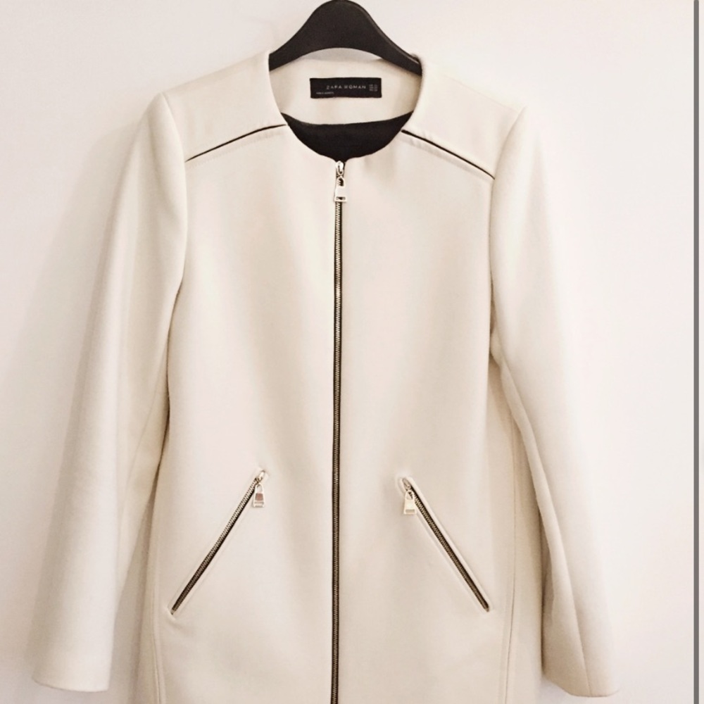 White zara coat with zipper detail.